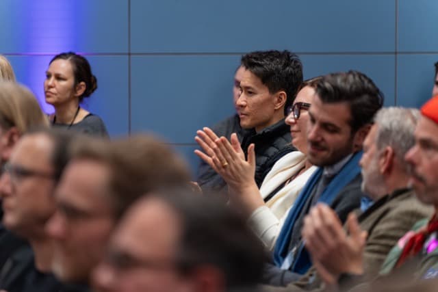 Applaudierendes Publikum während einer Präsentation beim MUUUH!nwalk