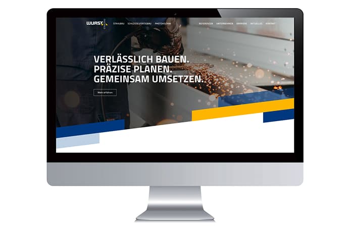 Desktop-Mockup der neuen WURST Stahlbau Website mit dem Claim 'Verlässlich bauen. Präzise planen. Gemeinsam umsetzen.'
